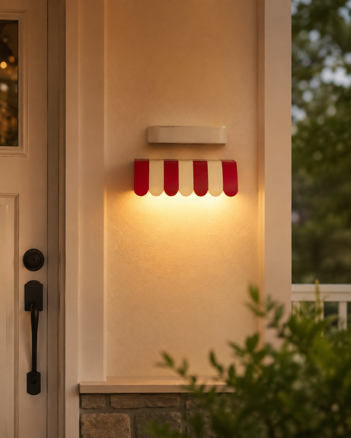Red-and-white Awning Wall Light glowing beside an entryway